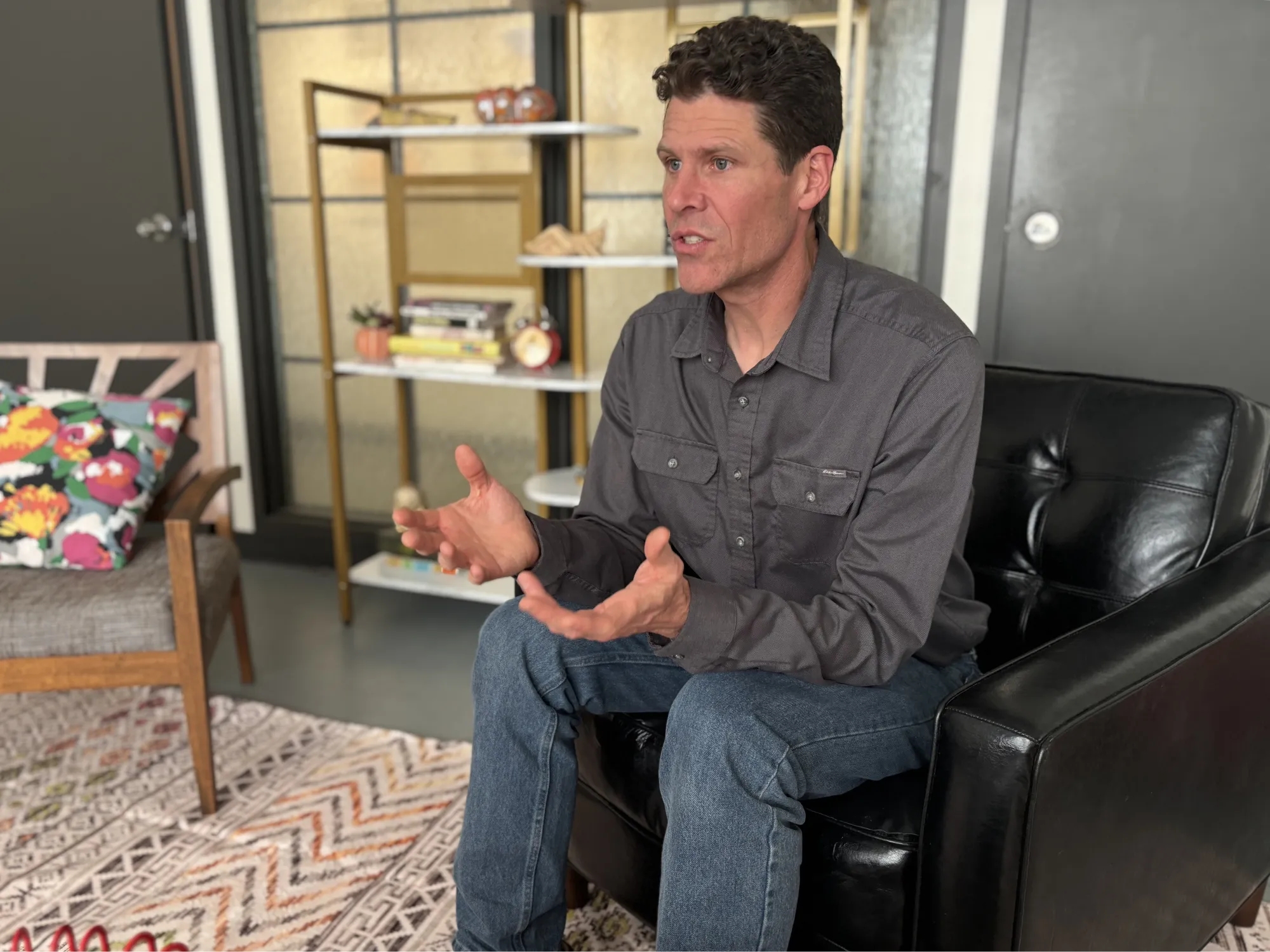 Andy, psychotherapist, working at his desk